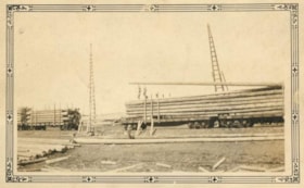 Loading timber poles on the Grand Trunk Pacific. (Images are provided for educational and research purposes only. Other use requires permission, please contact the Museum.) thumbnail