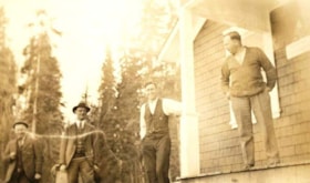 Four men standing by building; L.B. Warner is second from the left. (Images are provided for educational and research purposes only. Other use requires permission, please contact the Museum.) thumbnail