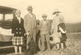 Hanson family in front of decorated Studebaker. (Images are provided for educational and research purposes only. Other use requires permission, please contact the Museum.) thumbnail