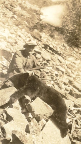 Jack Hanson with a dead black bear. (Images are provided for educational and research purposes only. Other use requires permission, please contact the Museum.) thumbnail