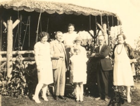 Group photo in garden. (Images are provided for educational and research purposes only. Other use requires permission, please contact the Museum.) thumbnail