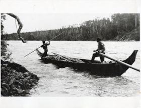 Indigenous persons poling up the Skeena River in a dugout canoe.. (Images are provided for educational and research purposes only. Other use requires permission, please contact the Museum.) thumbnail