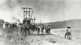 Crowd watching railway track construction. (Images are provided for educational and research purposes only. Other use requires permission, please contact the Museum.) thumbnail