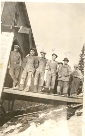 Group of men in front of Duthie Mine. (Images are provided for educational and research purposes only. Other use requires permission, please contact the Museum.) thumbnail