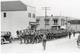 14th Aerodrome Defence Company on Main Street, leaving for Annette Island.. (Images are provided for educational and research purposes only. Other use requires permission, please contact the Museum.) thumbnail