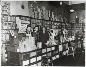 Fred Jr., Wilfred, Fred Sr., and Joe Watson in Watson General Store. (Images are provided for educational and research purposes only. Other use requires permission, please contact the Museum.) thumbnail
