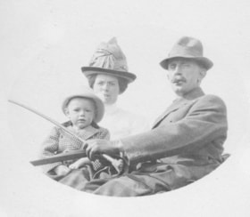 Ed, Annie, and Billy Orchard on a wagon. (Images are provided for educational and research purposes only. Other use requires permission, please contact the Museum.) thumbnail