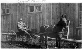 Mac (McDonald) outside Sargent's general store. (Images are provided for educational and research purposes only. Other use requires permission, please contact the Museum.) thumbnail