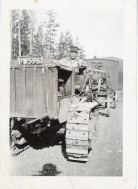 [?] Bannister with cat tractor, grader, and caboose. (Images are provided for educational and research purposes only. Other use requires permission, please contact the Museum.) thumbnail