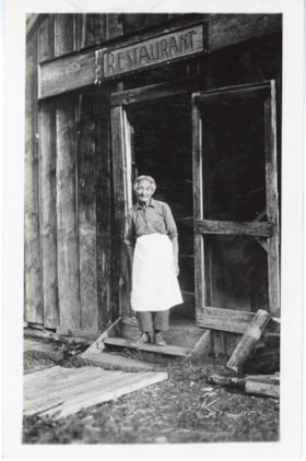 Charlie Ling in front of restaurant in New Hazelton, B.C.. (Images are provided for educational and research purposes only. Other use requires permission, please contact the Museum.) thumbnail