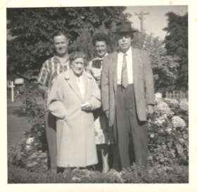 Dr. R.C. Bamford and Amy Bamford with their son and his wife standing behind. (Images are provided for educational and research purposes only. Other use requires permission, please contact the Museum.) thumbnail