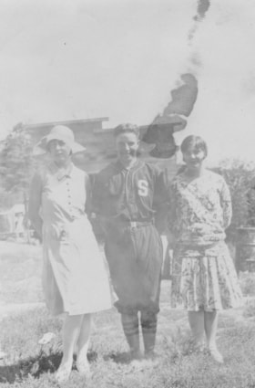 Nurse Cunningham, [John or Larry?] DeVoin, and Linnea Hanson at a Burns Lake Baseball game. (Images are provided for educational and research purposes only. Other use requires permission, please contact the Museum.) thumbnail