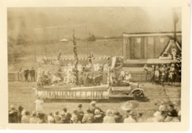 Canadian Legion float in a parade. (Images are provided for educational and research purposes only. Other use requires permission, please contact the Museum.) thumbnail