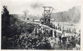 Laying of the Grand Trunk Pacific Railway tracks near Telkwa, B.C.. (Images are provided for educational and research purposes only. Other use requires permission, please contact the Museum.) thumbnail