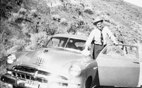 Jack Goold with car. (Images are provided for educational and research purposes only. Other use requires permission, please contact the Museum.) thumbnail