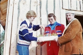 Cutting a cake at the opening of the Houston Ski Hill. (Images are provided for educational and research purposes only. Other use requires permission, please contact the Museum.) thumbnail