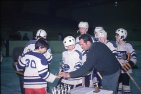Boys receiving trophies at Houston Minor Hockey windups. (Images are provided for educational and research purposes only. Other use requires permission, please contact the Museum.) thumbnail