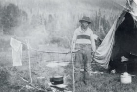 Dave Wiggins at camp north of 'second cabin'. (Images are provided for educational and research purposes only. Other use requires permission, please contact the Museum.) thumbnail