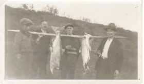 Ernest Hann and three unidentified persons with caught fish. (Images are provided for educational and research purposes only. Other use requires permission, please contact the Museum.) thumbnail