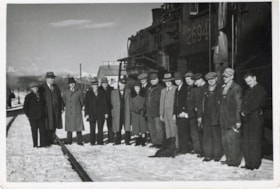 Group photograph by CN locomotive, Smithers BC. (Images are provided for educational and research purposes only. Other use requires permission, please contact the Museum.) thumbnail