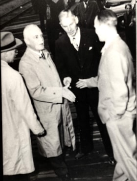 Louis St. Laurent with three other men. (Images are provided for educational and research purposes only. Other use requires permission, please contact the Museum.) thumbnail