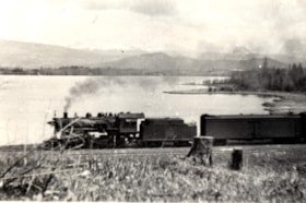 A Grand Trunk Pacific train passing Lake Kathlyn. (Images are provided for educational and research purposes only. Other use requires permission, please contact the Museum.) thumbnail