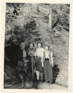 Mary Simpson and nieces at the entrance of the Victory mine claim. (Images are provided for educational and research purposes only. Other use requires permission, please contact the Museum.) thumbnail