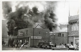 Fire at the Smithers Confectionary and Meadowland Inn building. (Images are provided for educational and research purposes only. Other use requires permission, please contact the Museum.) thumbnail