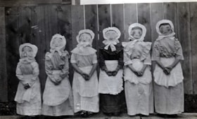 Girls in costume at Smithers Elementary School. (Images are provided for educational and research purposes only. Other use requires permission, please contact the Museum.) thumbnail