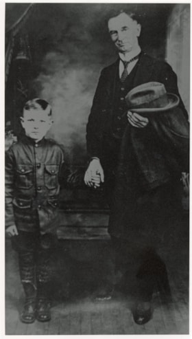 Joseph Coyle with son Patrick.. (Images are provided for educational and research purposes only. Other use requires permission, please contact the Museum.) thumbnail