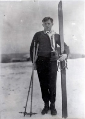 Chris Dahlie with 1933 trophy. (Images are provided for educational and research purposes only. Other use requires permission, please contact the Museum.) thumbnail
