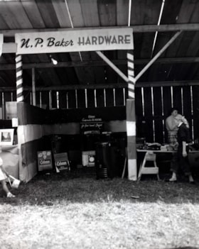 N.P. Baker Hardware booth at Bulkley Valley Fall Fair. (Images are provided for educational and research purposes only. Other use requires permission, please contact the Museum.) thumbnail