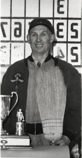 Art Simpson with Bulkley Motel Trophy. (Images are provided for educational and research purposes only. Other use requires permission, please contact the Museum.) thumbnail