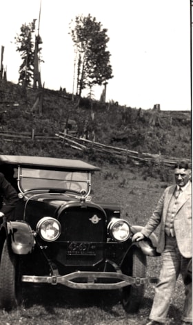 Jack McNeil with his car.. (Images are provided for educational and research purposes only. Other use requires permission, please contact the Museum.) thumbnail