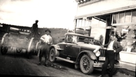 Jack McNeil and unknown man in front of Broughton & McNeil store, Telkwa, B.C.. (Images are provided for educational and research purposes only. Other use requires permission, please contact the Museum.) thumbnail