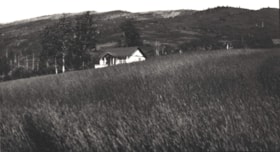 Unidentified house in a field.. (Images are provided for educational and research purposes only. Other use requires permission, please contact the Museum.) thumbnail