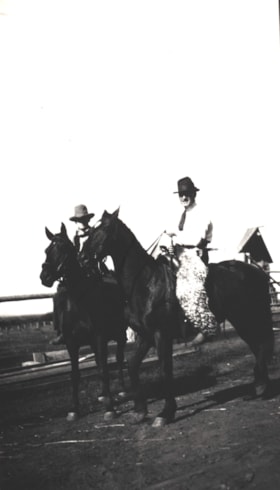 Jack McNeil and Clarence Goodacre on horseback. (Images are provided for educational and research purposes only. Other use requires permission, please contact the Museum.) thumbnail