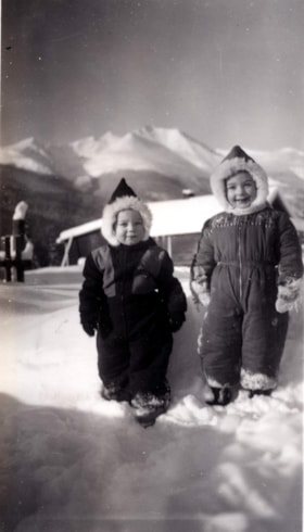 Lynn and Shervill McCammon with Hudson Bay Mountain in background. (Images are provided for educational and research purposes only. Other use requires permission, please contact the Museum.) thumbnail