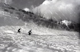 Two skiiers [at Malkow ski hill]. (Images are provided for educational and research purposes only. Other use requires permission, please contact the Museum.) thumbnail