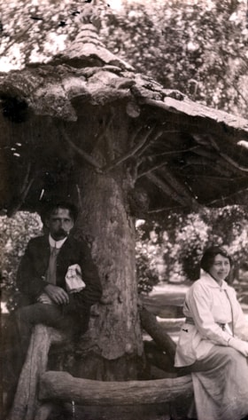 Unidentified man and woman under gazebo structure. (Images are provided for educational and research purposes only. Other use requires permission, please contact the Museum.) thumbnail