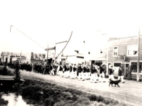 Main Street parade. (Images are provided for educational and research purposes only. Other use requires permission, please contact the Museum.) thumbnail
