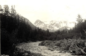 A creek with mountains in the background. (Images are provided for educational and research purposes only. Other use requires permission, please contact the Museum.) thumbnail
