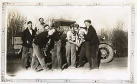 Group of boys with car. (Images are provided for educational and research purposes only. Other use requires permission, please contact the Museum.) thumbnail