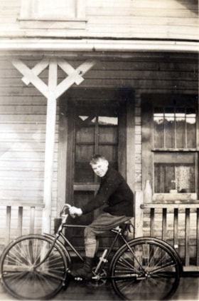 George Durham on a bicycle. (Images are provided for educational and research purposes only. Other use requires permission, please contact the Museum.) thumbnail