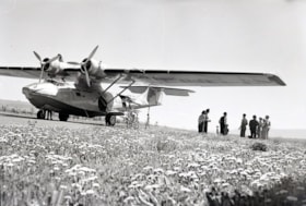 CPA plane in field. (Images are provided for educational and research purposes only. Other use requires permission, please contact the Museum.) thumbnail