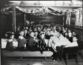 Large group of children in some kind of hall. (Images are provided for educational and research purposes only. Other use requires permission, please contact the Museum.) thumbnail