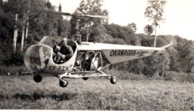 Carl Agar and Norm Hagan in an Okanagan Air Service helicopter. (Images are provided for educational and research purposes only. Other use requires permission, please contact the Museum.) thumbnail