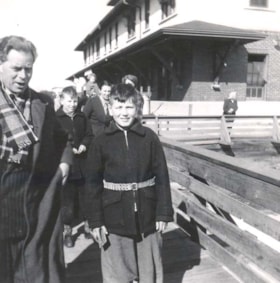 Stroet Family arriving at Smithers Train Station. (Images are provided for educational and research purposes only. Other use requires permission, please contact the Museum.) thumbnail