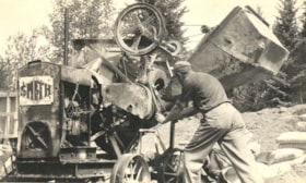 Mixing concrete for the Stroet Family house. (Images are provided for educational and research purposes only. Other use requires permission, please contact the Museum.) thumbnail