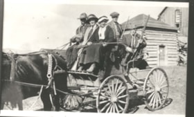 The Hoops family on a wagon. (Images are provided for educational and research purposes only. Other use requires permission, please contact the Museum.) thumbnail